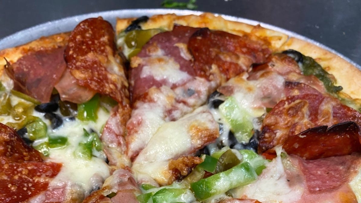 Vino's Signature Pizza.