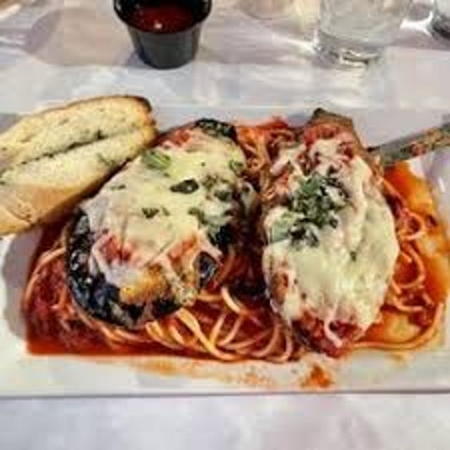 Eggplant Parmigiana Over Pasta.