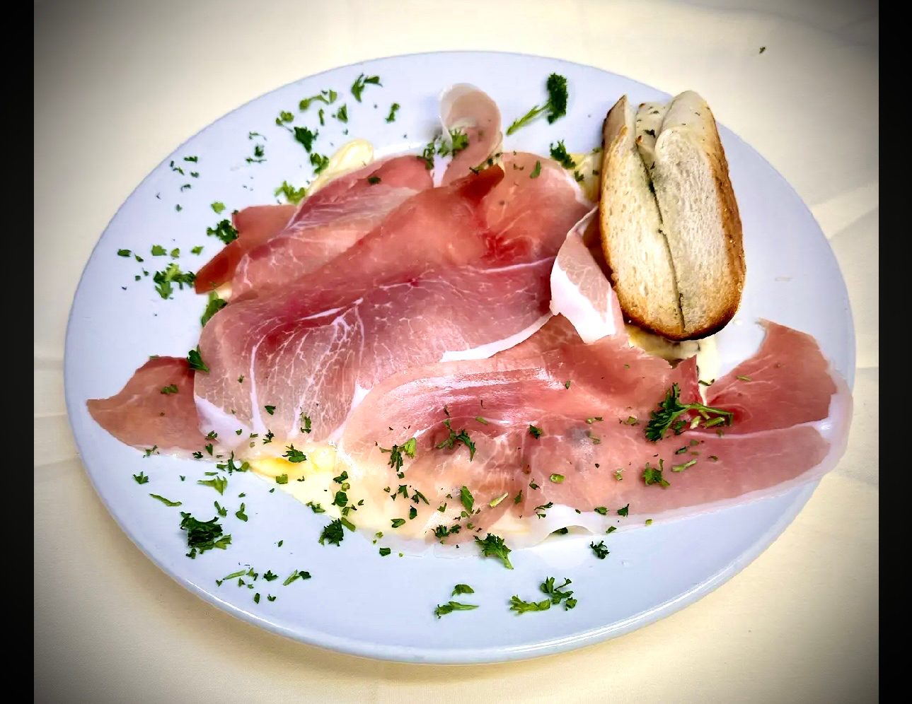 Tortellini con Prosciutto, Funghi, E Bisi.